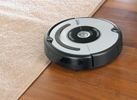 robot Roomba 620 sur tapis